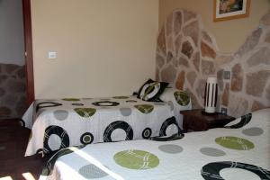 Dormitorio con 2 camas de Casa Laura - Las Doncellas